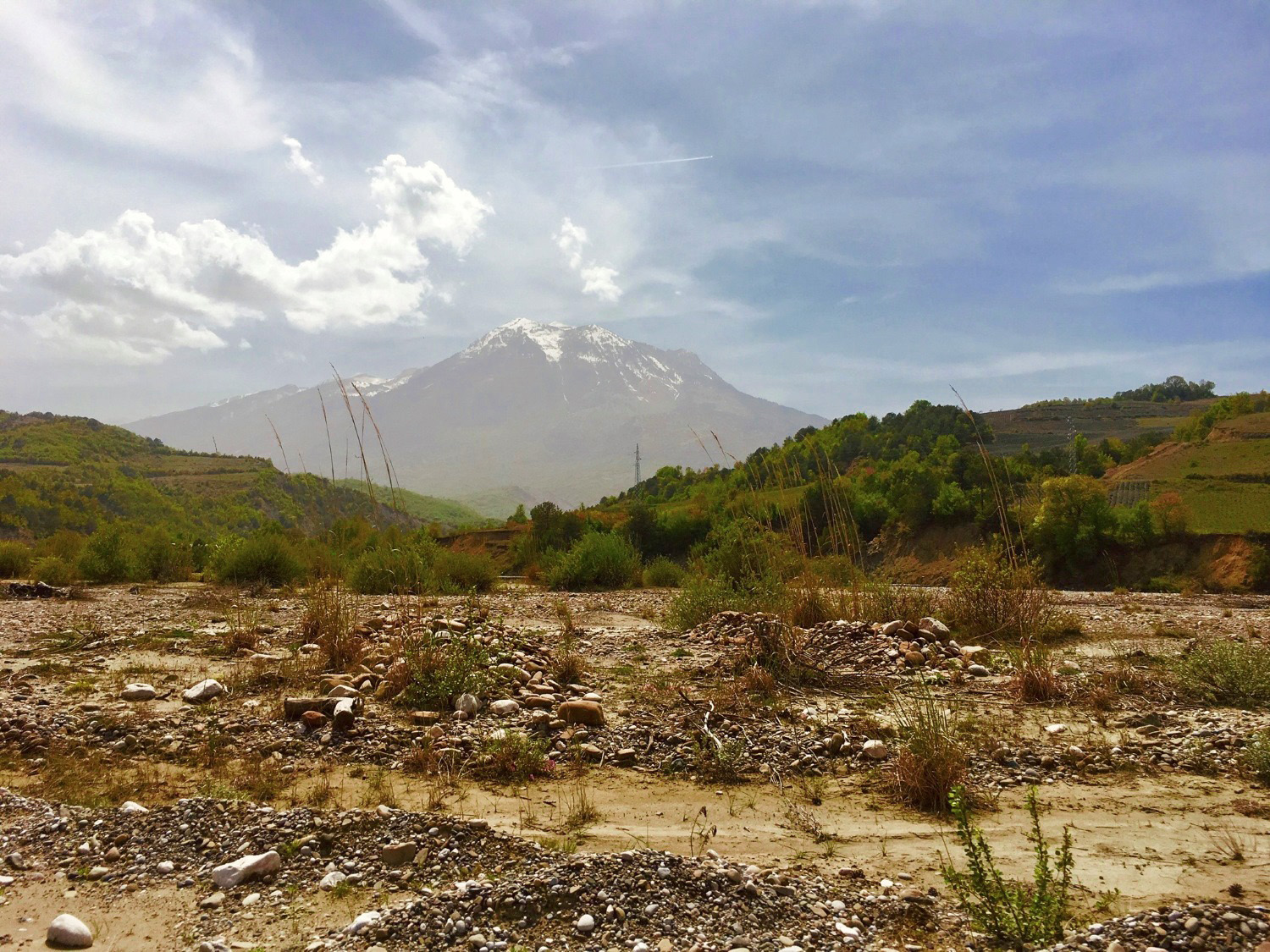 Mount Tomorr seen from the Devoll River — Albania's sacred summit above Berat